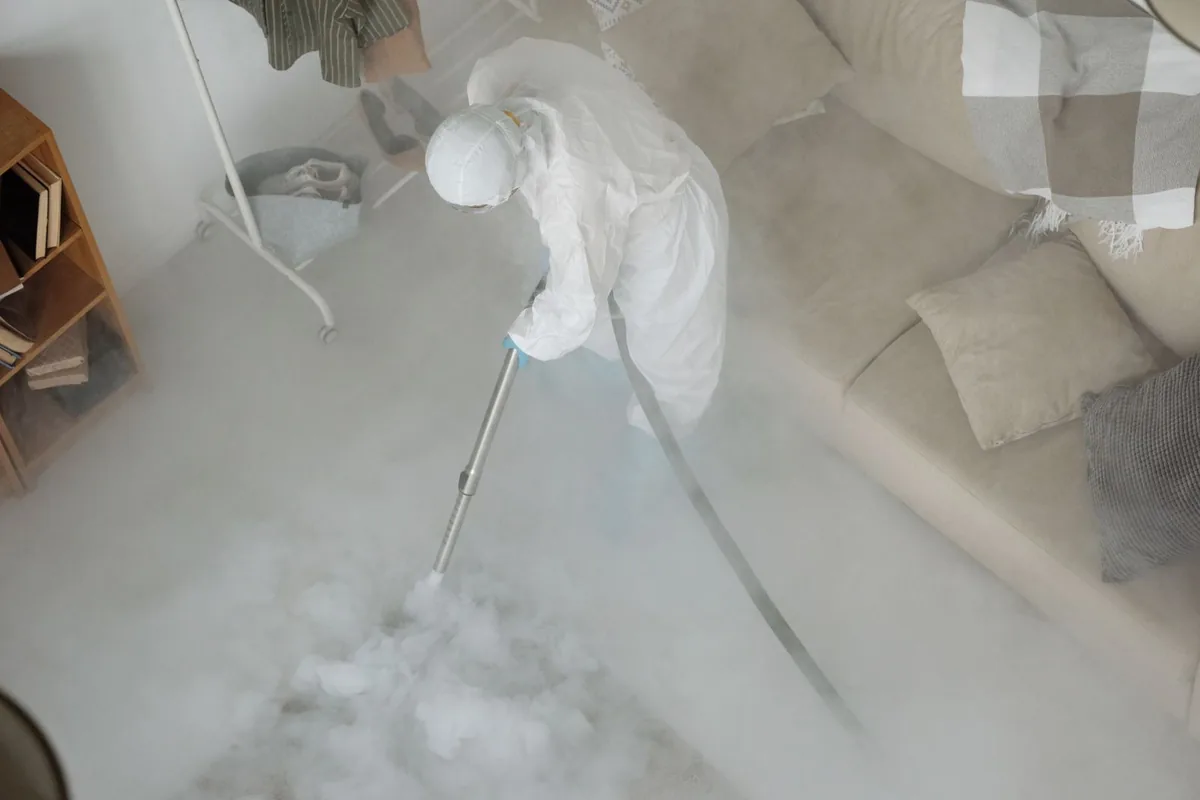 Biohazard cleanup technician in protective equipment, Ferndale, WA
